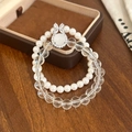 Detail of double-layer bracelet with white pearls and clear crystal beads on wooden surface - White Double Layer Pearl Glass Bead Bracelet (D-269)