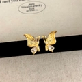 Detailed macro view of golden butterfly stud earrings with textured wings and zircon stones - Gold Butterfly Stud Earrings
