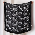 Detail of large square satin scarf featuring black and white floral and checkerboard patterns - Black and White Floral Pattern (SL1904-003) / 180*90CM