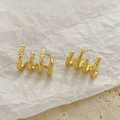 Textured gold four-claw stud earrings with hammered finish on natural stone background - Gold Textured Four-Claw Stud Earrings