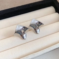 Minimalist silver geometric earrings with folded rhombus design in a jewelry box - Silver Pleated Stud Earrings