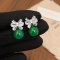 Boucles d'oreilles nœud en cristal élégantes avec pendentif pierre verte - Style Noeud Papillon Perle Verte / Argenté