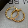 Élégantes boucles d'oreilles créoles torsadées dorées avec design à texture spirale - Doré