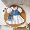 Flat lay of girl's puff sleeve shirt dress with denim vest and matching bow bag - Royal Blue (Bag + Dress) / 6-9M