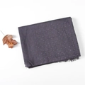Detail of dark purple-gray linen shawl featuring white polka dots and fringed edges - Navy Blue