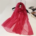 Detail of rose red mulberry silk wool scarf showing semi-transparent woven texture - 190cm x 90cm / Rose Red