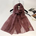 Detail of dark burgundy silk wool scarf with subtle texture and lightweight feel - 190cm x 90cm / Wine Red