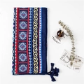 Detail shot of navy bohemian shawl featuring complex floral prints and soft tassel edges - 180x100cm / Wine Red