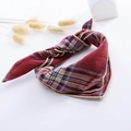 Detailed view of children cotton linen scarf with vintage plaid pattern and fringe balls - Small Plaid Wine Red