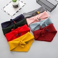 Lot de huit bandeaux tricotés avec glands de différentes couleurs pour les enfants - Couleurs Mixte