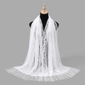 White hollow lace shawl with paisley floral patterns and long tassels on a model stand - White (VE123)