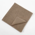 Detail of mercerized cotton scarf showing brown fabric texture and fine white edge stitching - 110*110 / Khaki