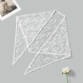 Detailed close-up of white floral lace embroidery and delicate crochet edges of the triangle scarf - White