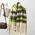 Macro detail of thick winter scarf with green and grey gradient stripes and tassels - Grey Green