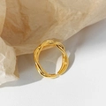 Detailed macro shot of a golden twisted double-line intertwined open ring design - Gold Ring