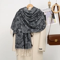 Detail of dark grey paisley scarf with fringe hem over a beige handmade wool coat - YR352-01# Black