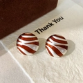 Silver round earrings with brown zebra patterns and glossy finish on textured paper - Round Zebra Style (A-1789)