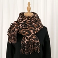 Detailed view of the leopard print scarf with long fringe edges and thick texture - 3# Black & Coffee
