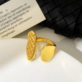 Macro shot of gold asymmetric open mesh ring showing hollow geometric details - Adjustable Open Design / Gold