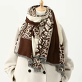 Thick leopard print cashmere scarf with fringe tassels shown on a beige coat - 180*70cm / Dark Coffee