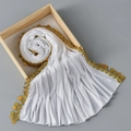 Detail of white mercerized cotton hijab with golden sequin tassels and pleated texture - 185x55cm / White (SW070-2)