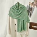 Teal cashew printed shawl with yellow paisley patterns and white tassels on a coat - Green (VS929)