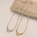 Eleganti collane di perle in oro e argento con chiusura OT su piatto di ceramica - Stile Ciondolo a Cuore Dorato (B-36)