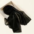 Detail of black chiffon hijab scarf with elegant hot-fix rhinestones in geometric patterns - Black