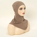 Detail of dark brown mercerized cotton hijab underscarf with neck coverage on mannequin - Khaki
