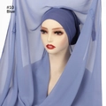 Light blue chiffon hijab set with matching navy undercap shown on a mannequin head - Blue