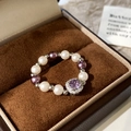 Detail of beaded pearl ring with square purple stone in a luxury velvet jewelry box - Purple Square Zircon White Purple Pearl Style