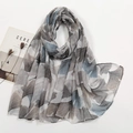 Detail view of lightweight voile scarf featuring artistic blue ginkgo leaf prints - Grey Light Blue Ginkgo Leaf (VS714-1)