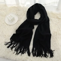 Classic solid black cashmere feel long scarf with elegant fringes on white fur rug - Black