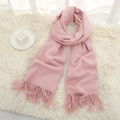 Pink cashmere-feel thick scarf with tassels on white fluffy carpet background - Dusky Pink