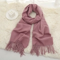 Thick knit winter scarf in dusty rose pink with tassel fringe on soft plush background - Leather Red