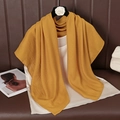 Detail of a ginger yellow cotton linen scarf showing soft drape and sheer texture - 90cmx90cm / Ginger Yellow
