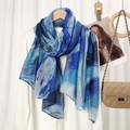 Detail of soft lightweight shawl with blue abstract print draped over a white background - VS869-5# Blue Print