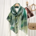 Detail of soft green abstract floral scarf styled with a classic chain handbag - VS869-6# Green Print
