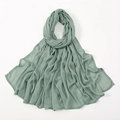 Close-up of sage green modal hijab featuring vertical pleated texture and neat edges - 190*85cm / Light Grass Green