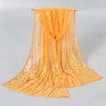 Detailed close-up of orange translucent scarf with elegant gold peacock feather print - 165*50cm / Orange