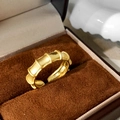Detail of adjustable bamboo joint ring with matte gold finish on velvet background - Matte Bamboo Style (C-89)
