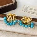 Detail of gold tassel earrings with zircon studs and sky blue turquoise beads - Gold Blue Natural Stone Tassel Stud Earrings