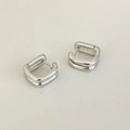 Detailed view of minimalist double-layered square hoop earrings with polished silver finish - Silver