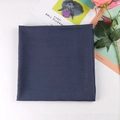 Detailed view of navy blue solid color square scarf with fine plain weave texture - Jean Blue