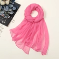 Detail shot of bright pink 30D chiffon scarf with lightweight and textured fabric finish - Rose Pink