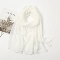 White lightweight linen scarf with textured polka dot pattern on a minimalist background - White