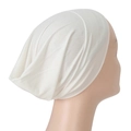 Detail view of white modal hijab undercap featuring soft pleated side texture and elastic fit - One Size / Creamy White