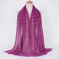 Magenta sequin scarf with gold stripes and vertical pleats on a studio mannequin - 18# Rose Red