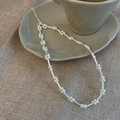 Elegant silver chain necklace with pearl flower accents on a ceramic cup display - Pearl Flower Shape (B-272)