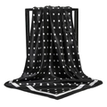 Detailed view of a black and white polka dot satin square scarf draped on a frame - 90x90cm / Black (FJ137-01)